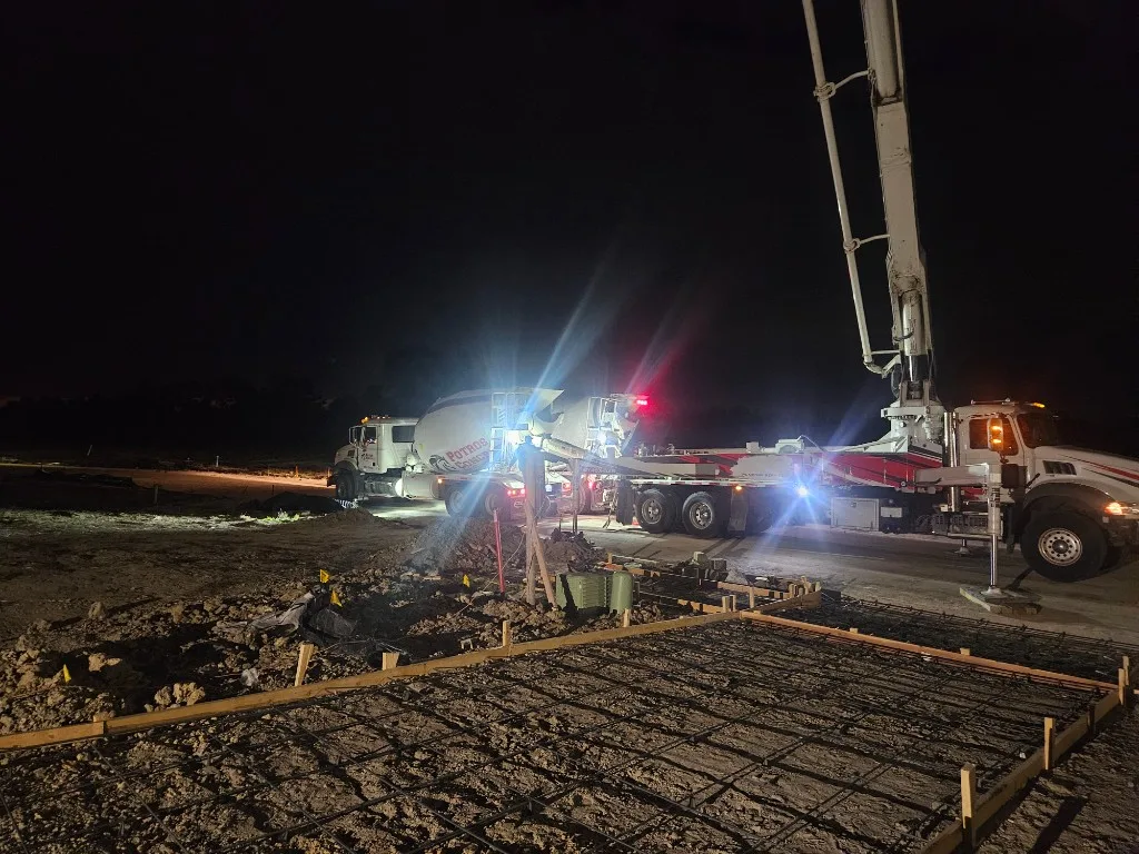 Potros Concrete LLC night pour with mixer and pump on the job